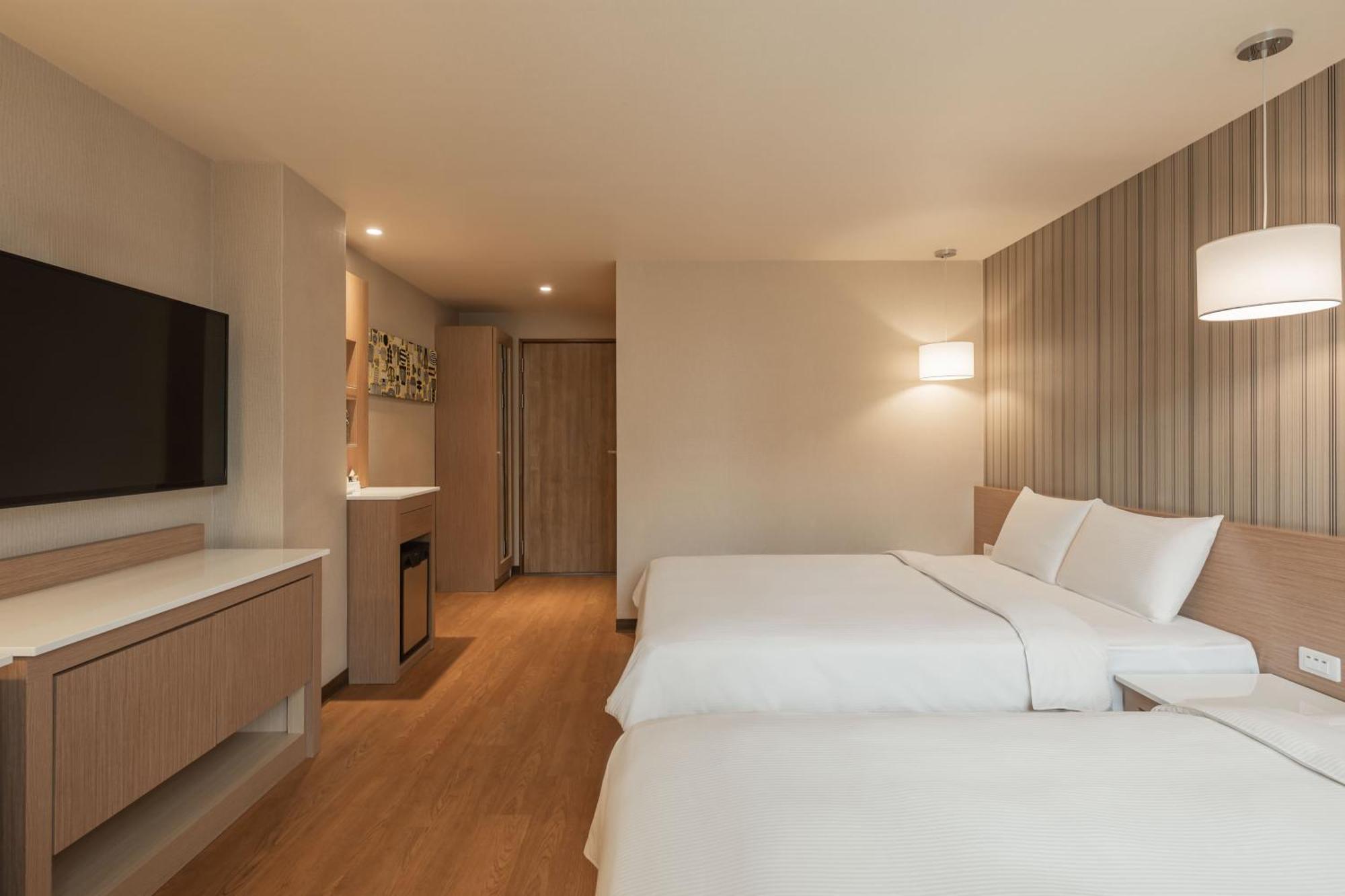 Kindness Hotel-Jue Ming Kaohsiung Room photo